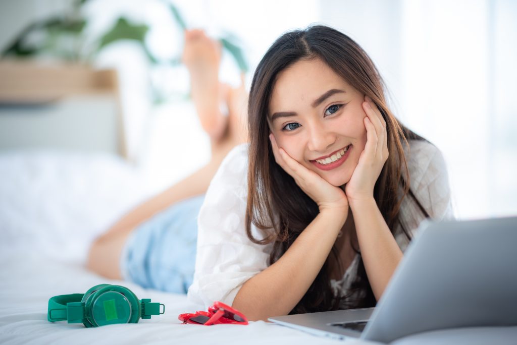 young women working business from home with laptop, concept of freelancer and egg donor working from home